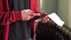 Person taking picture of receipt