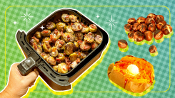 An air fryer basket full of roasted Brussels sprouts with sweet potatoes and chestnuts floating nearby.