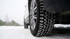 Car wheel in snow