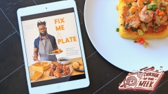 Fix Me a Plate e-cookbook next to a plate of shrimp and polenta.