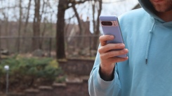 man using pixel outside