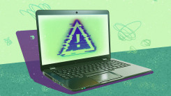 a pc laptop with a warning on the screen
