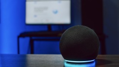 amazon echo in a darkly lit room