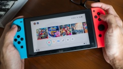 person playing nintendo switch