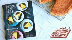 Justice of the Pies cookbook next to a sweet potato pie.