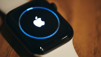 A photo of an Apple Watch displaying the update screen