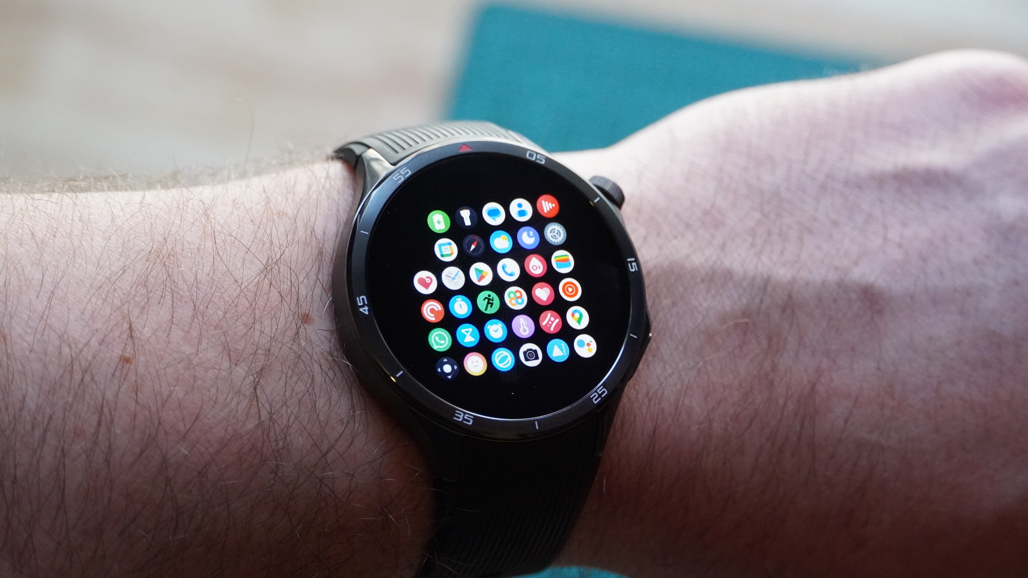OnePlus Watch 3 on a wrist showing app screen
