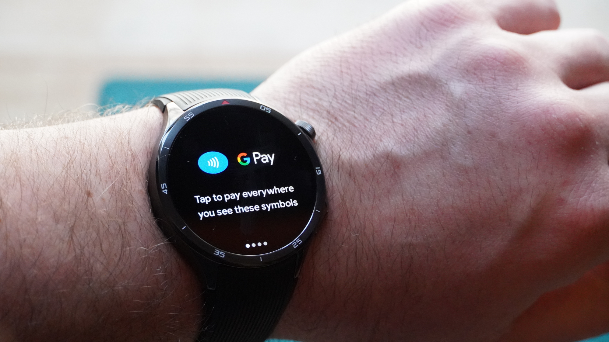 OnePlus Watch 3 on a wrist showing Google Wallet