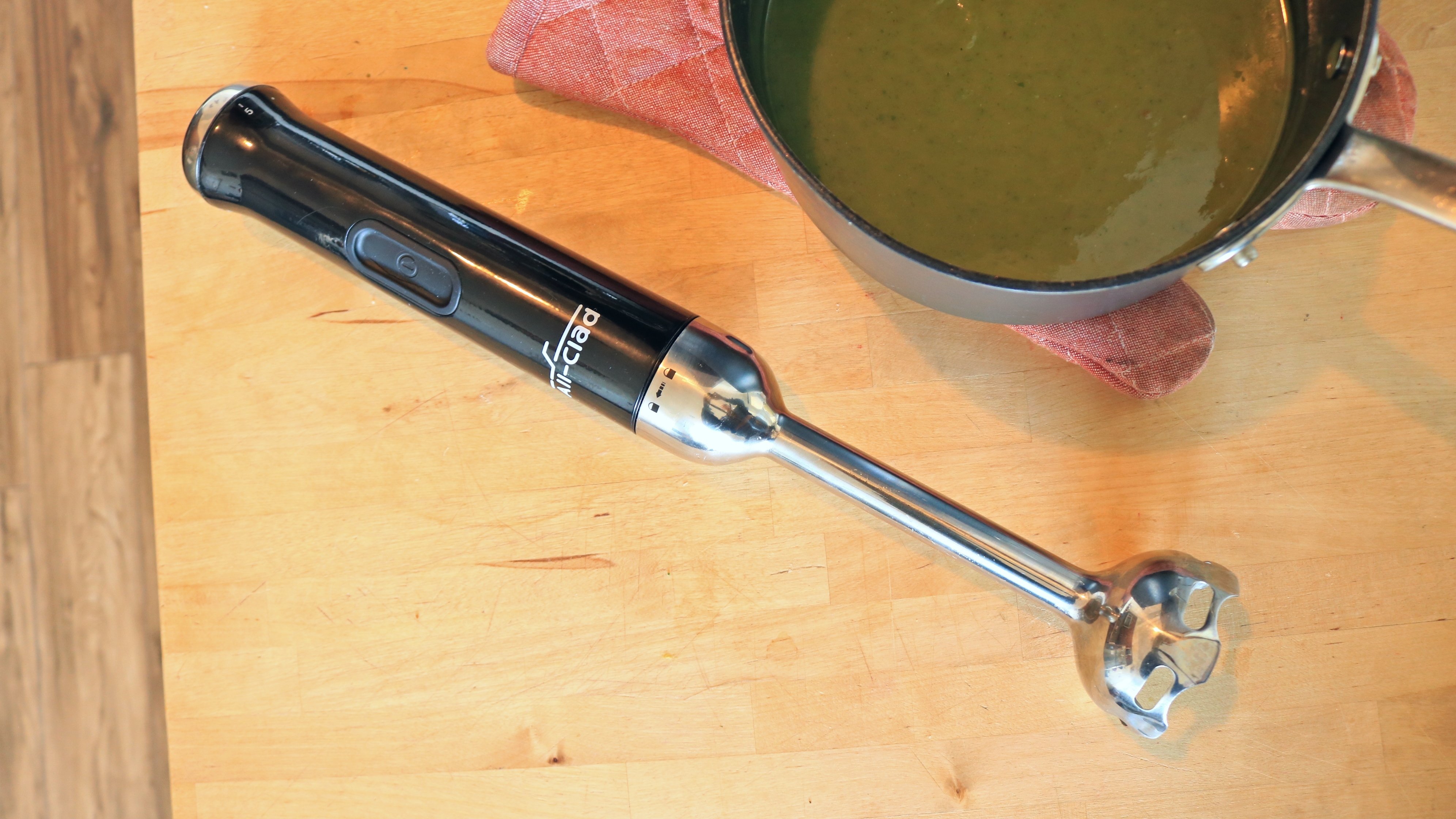 All-Clad stick blender on a counter top.