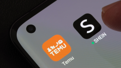 TEMU and SHEIN apps seen on the screen of smartphone.