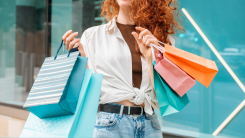 Young woman with shopping bags.