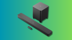 The Amazon Fire TV Soundbar Plus on a teal and green background.