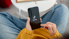 person using tiktok app on a smartphone