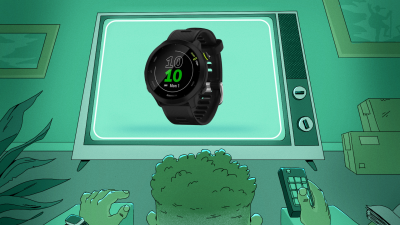 Man watching television screen displaying a Garmin Forerunner 55.
