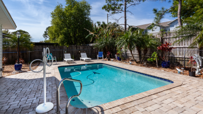 An in-ground pool in a small backyard