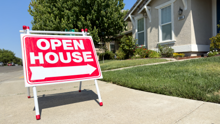 open house sign outside of a home
