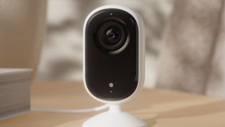 A screenshot from a demo video showing the Arlo Indoor Camera on a table