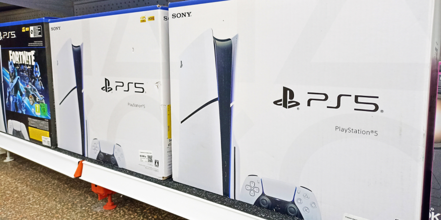 PlayStation 5s on a shelf in a store