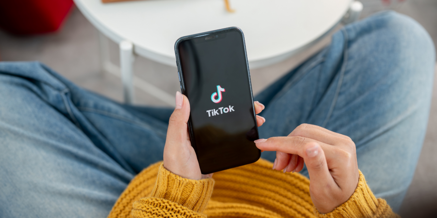 person using tiktok app on a smartphone