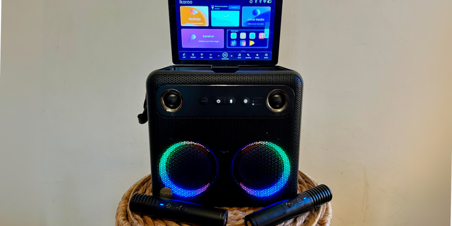 The Break X2 karaoke machine on a stool.